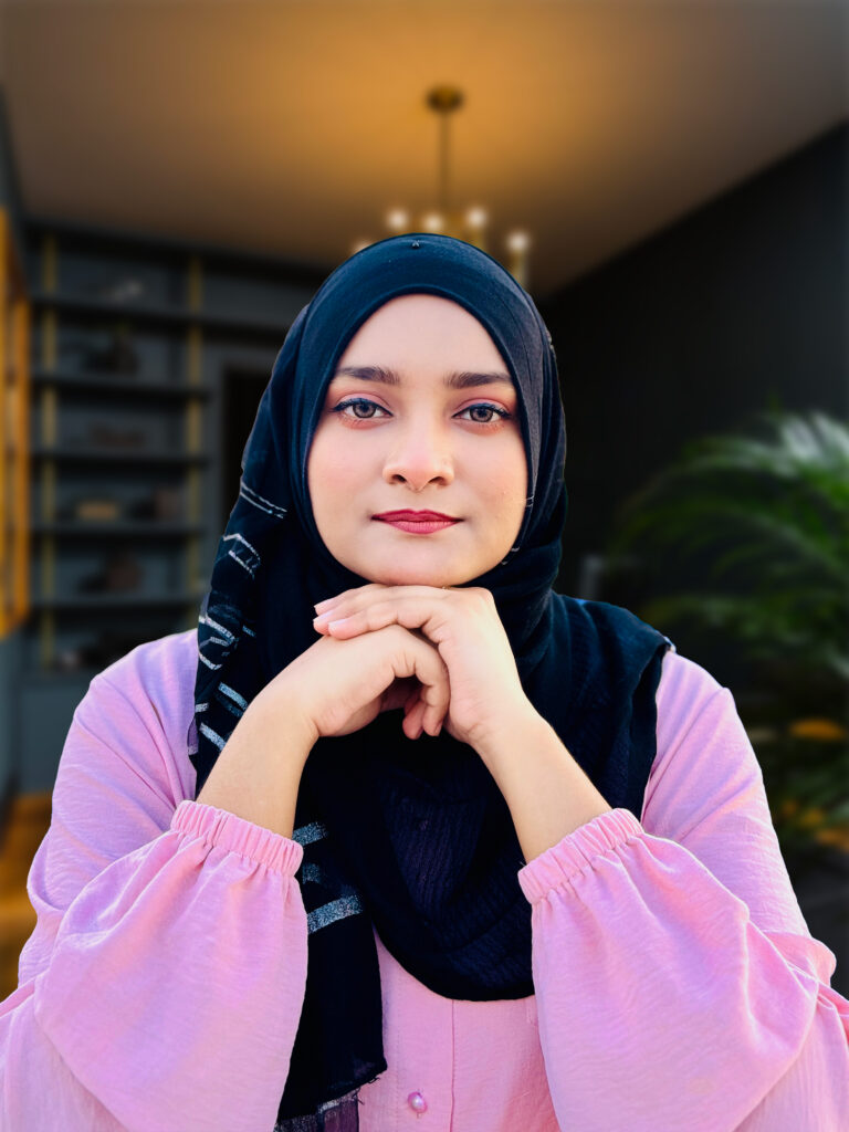 Professional portrait of Shanila Jhumur, freelance graphic designer and creative brand expert